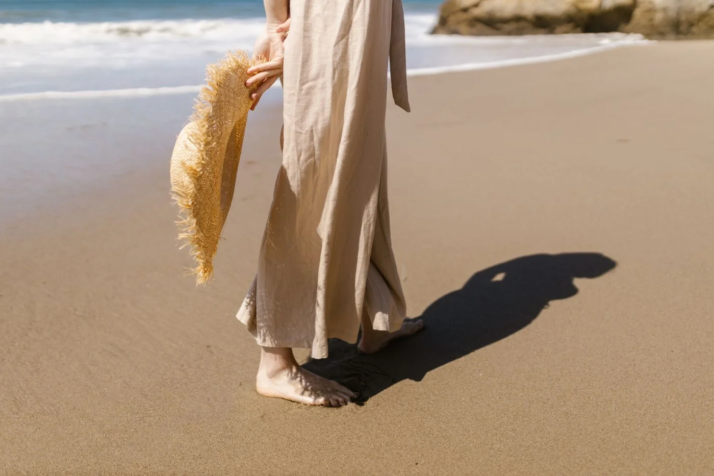 Linen trousers worn on a sandy beach