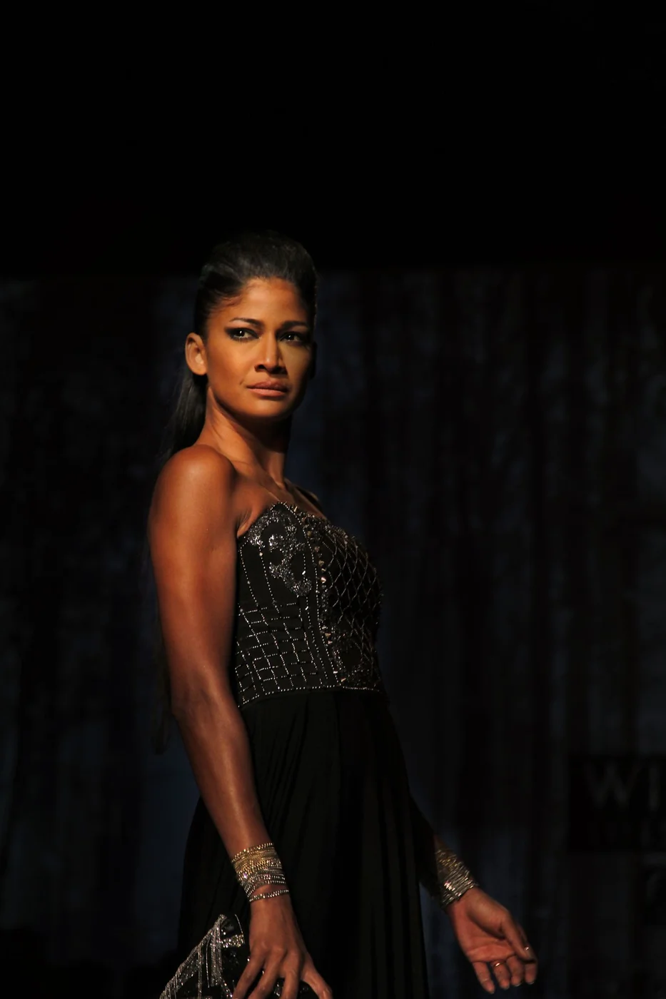 Formal dress in a dark studio