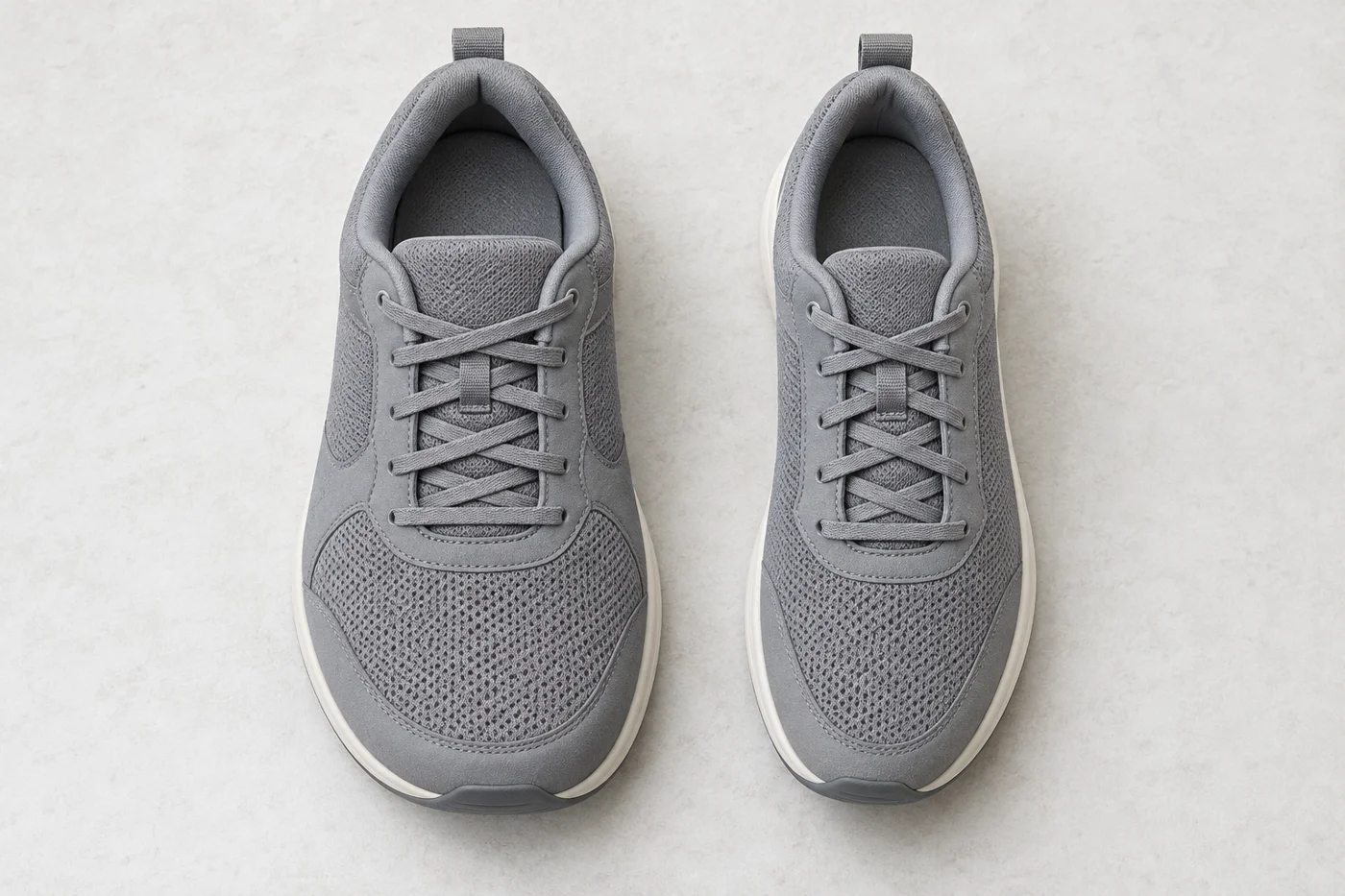 Two shoes of similar length with different forefoot widths