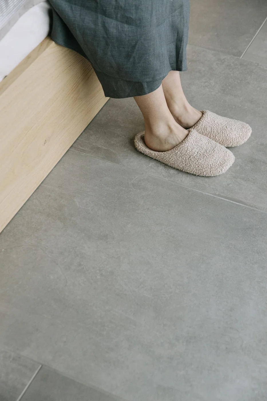 A person wearing indoor slippers