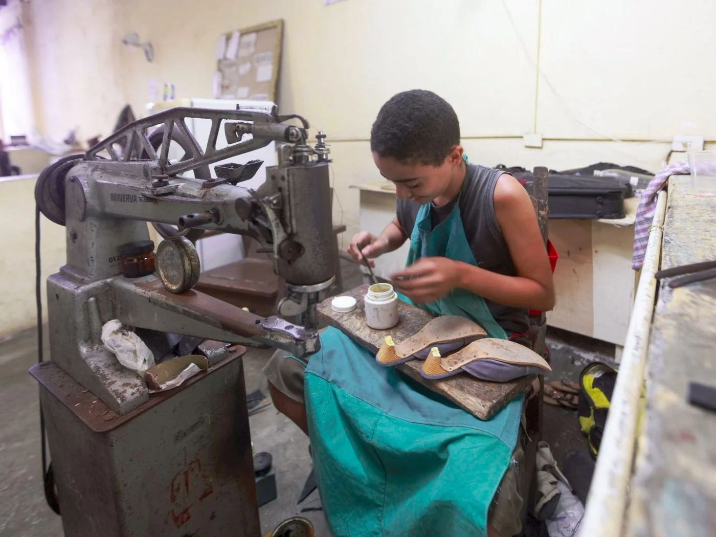 Shoe Repairer During Work