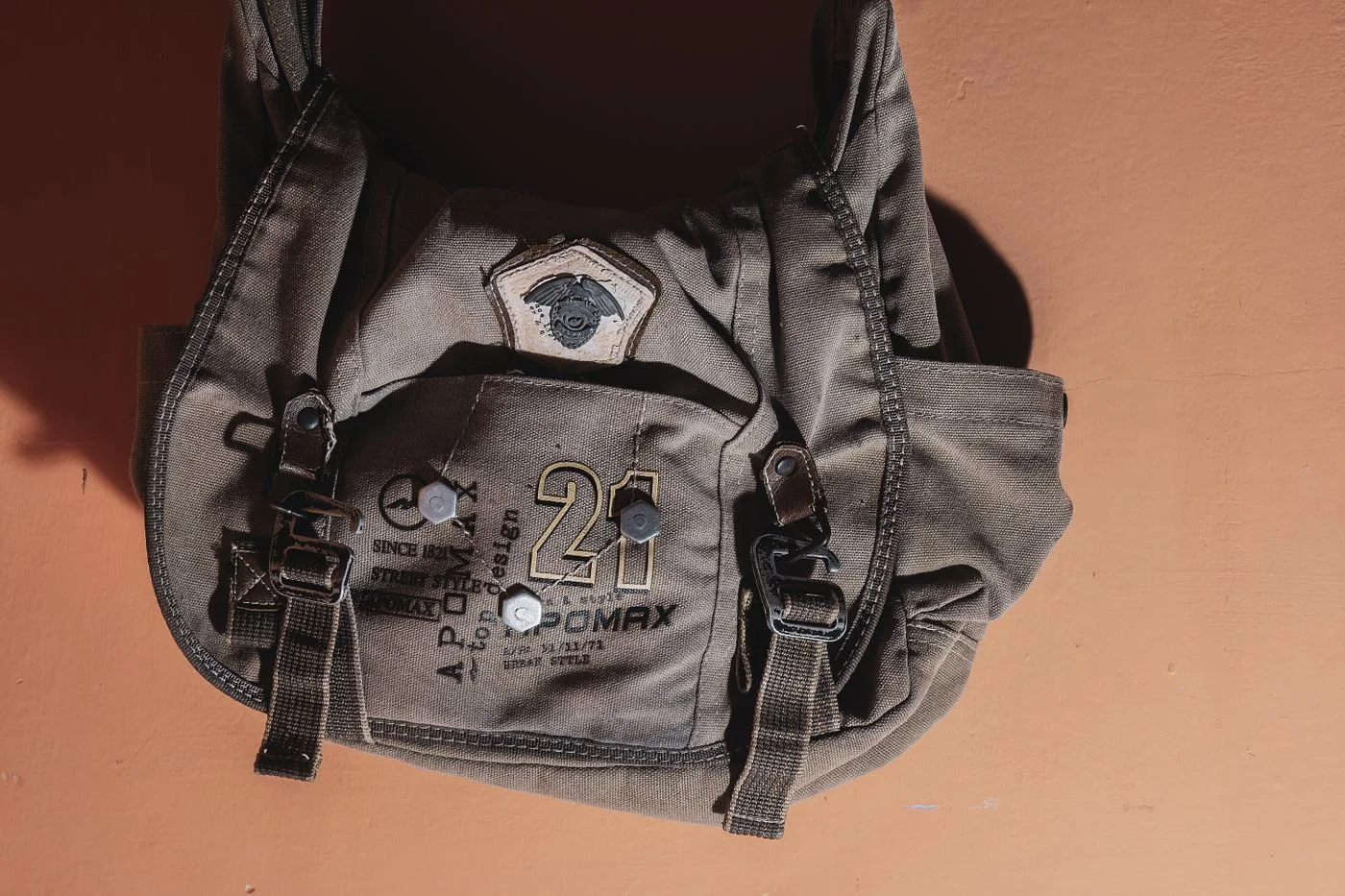 Gray fabric backpack with front pockets