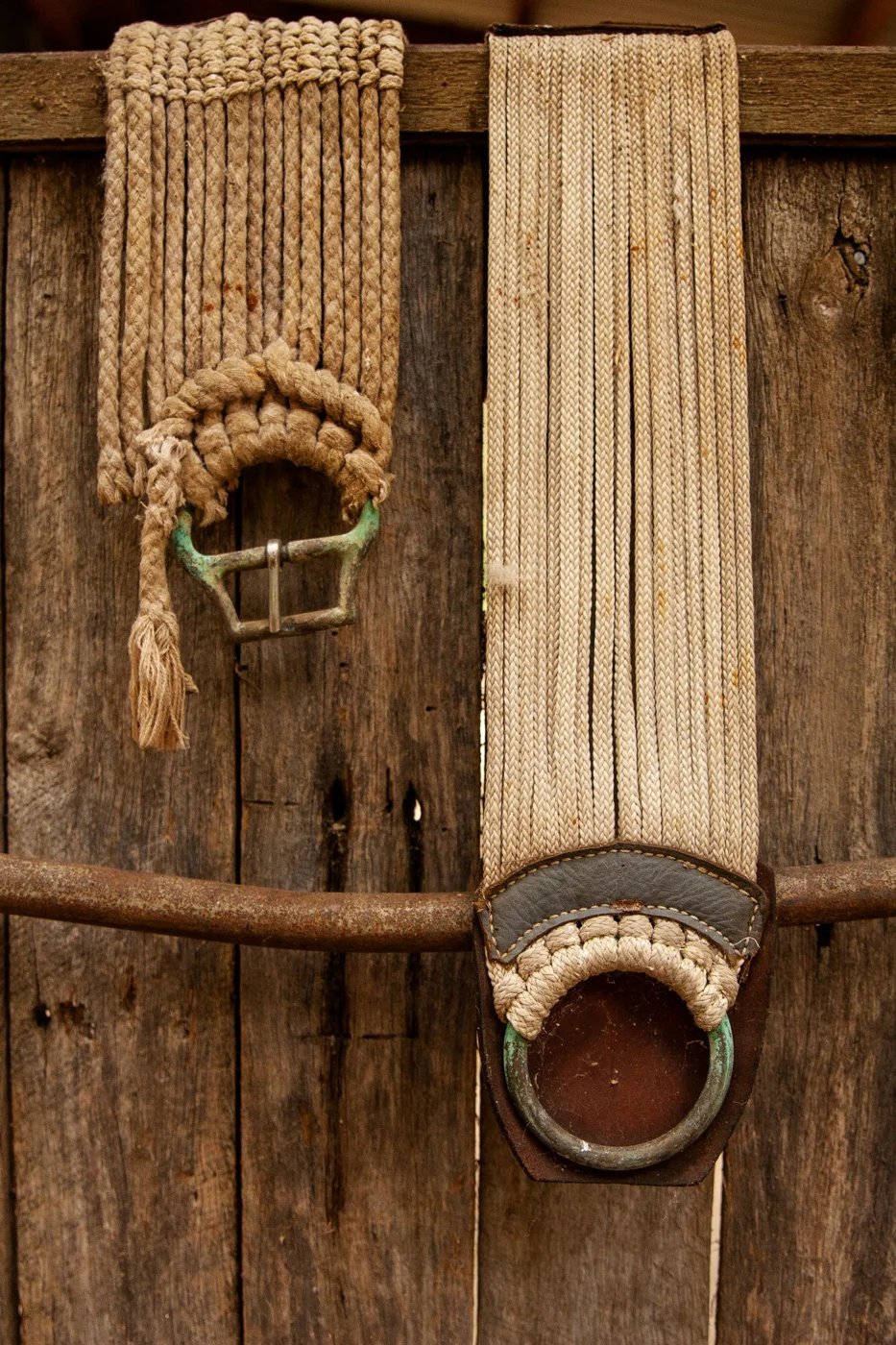 Braided cord belts hanging on a display
