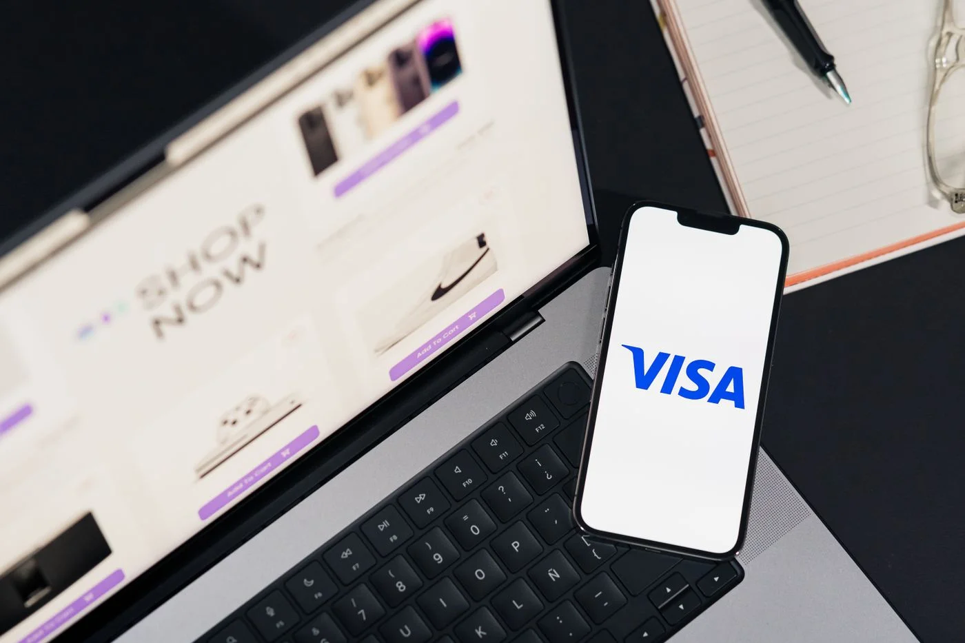 Online Shopping with Smartphone on Laptop