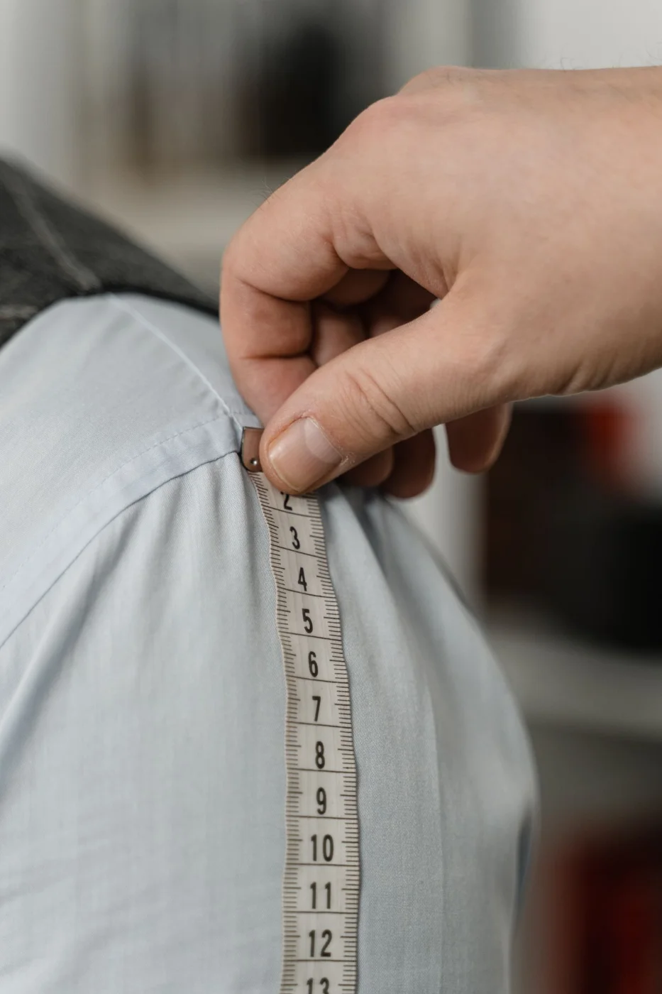 Tape Measure on a Person's Arm