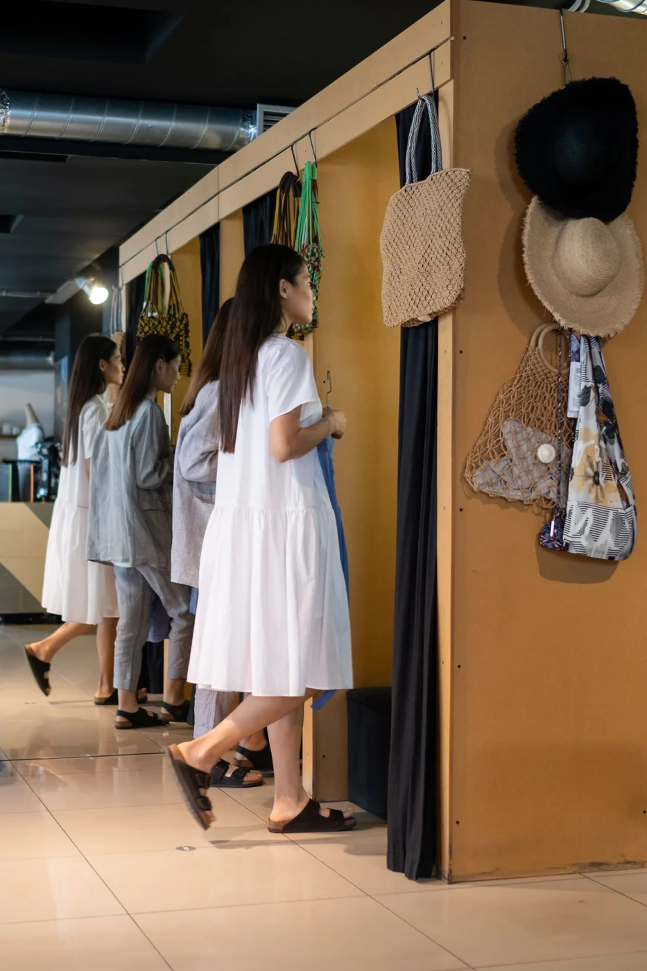 A Woman Entering a Fitting Room