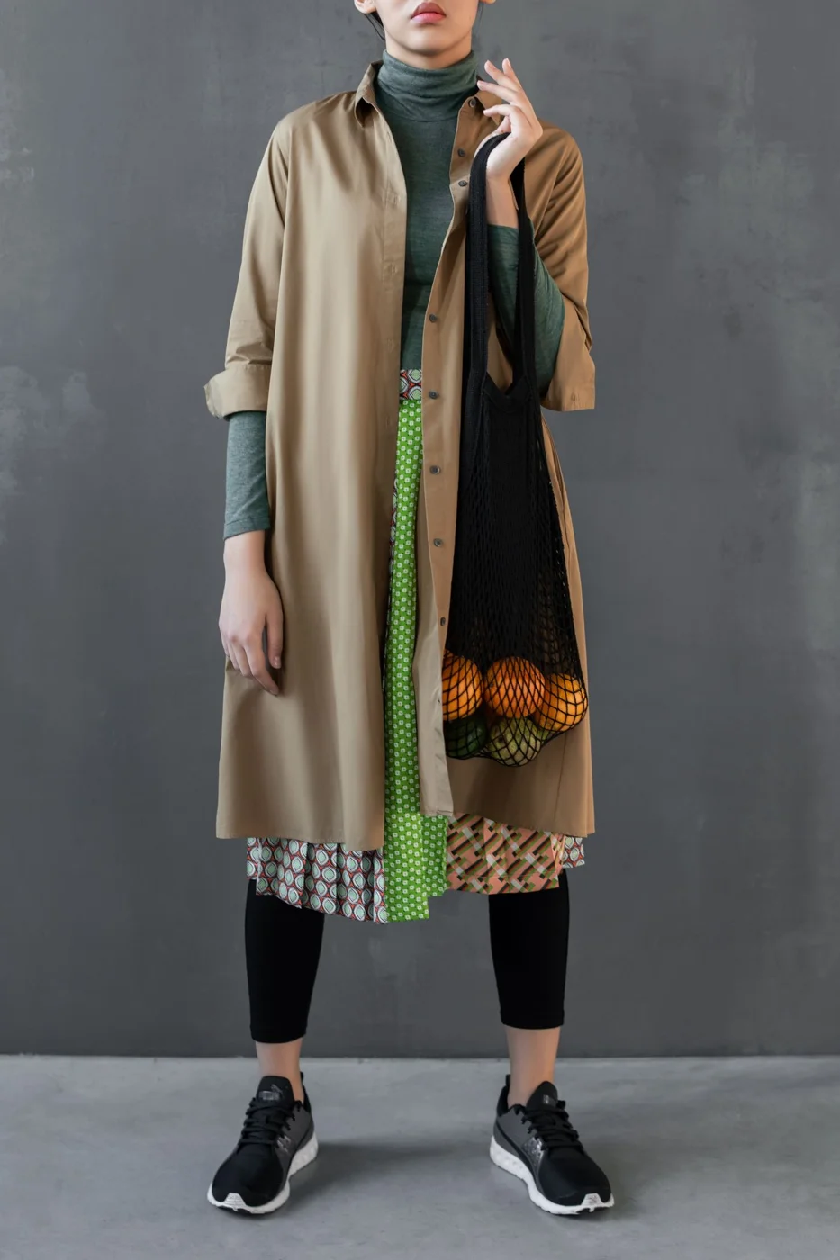 A coat worn over everyday layers
